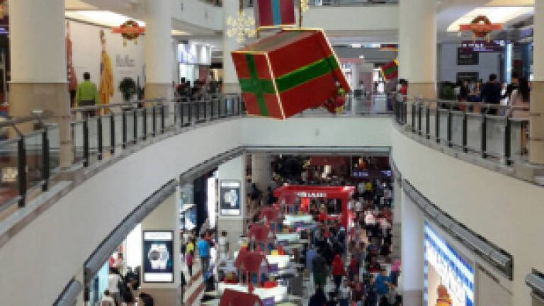 Crowds throng shopping malls on Christmas Day