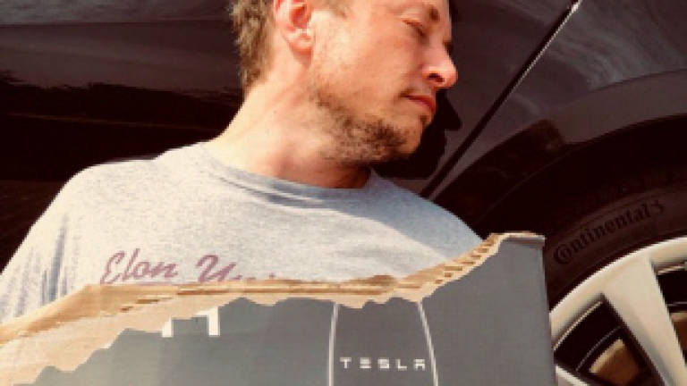 Elon Musk makes light of Tesla's woes in April 1 Twitter prank