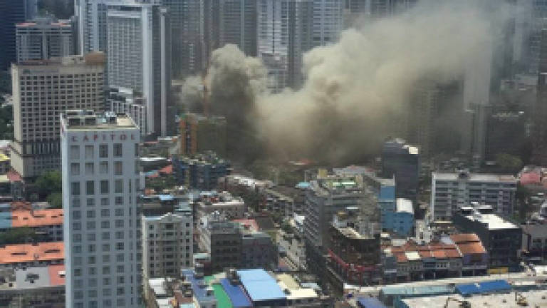 Fire razes two restaurants in the middle of KL (Updated)