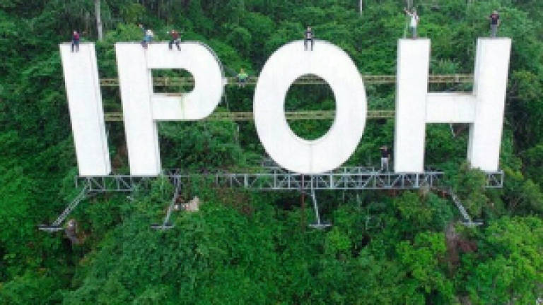Eight people involved in 'Ipoh' signboard climb released on police bail