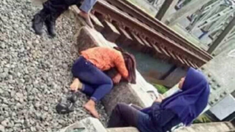 Girl survives after skull cracked open by train while taking selfies