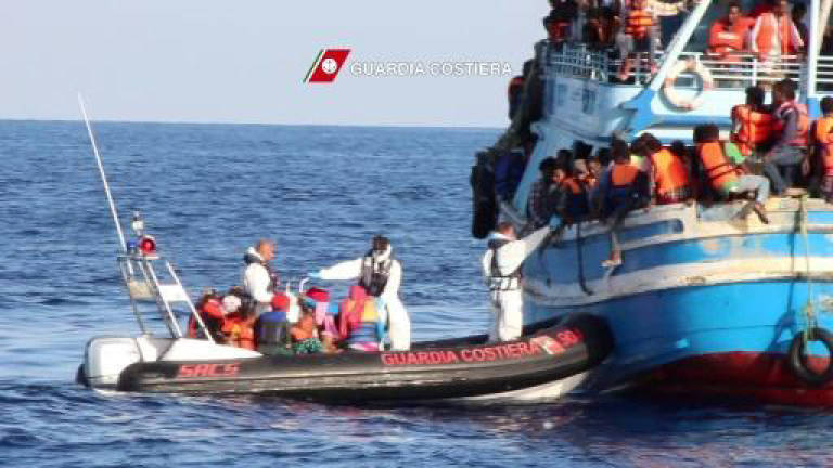 One dead as 1,000 migrants rescued off Libya