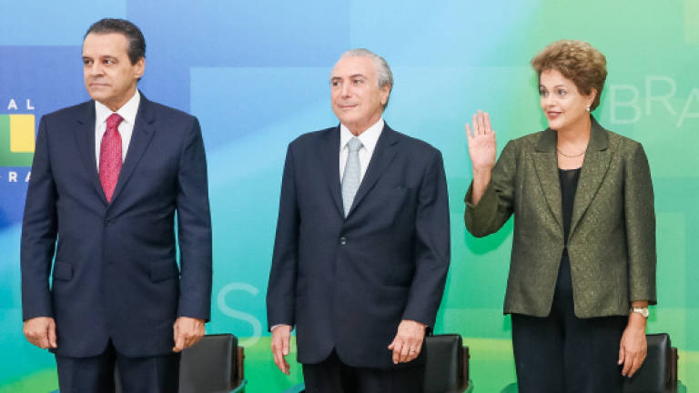 Third Brazil minister resigns over bribery scandal