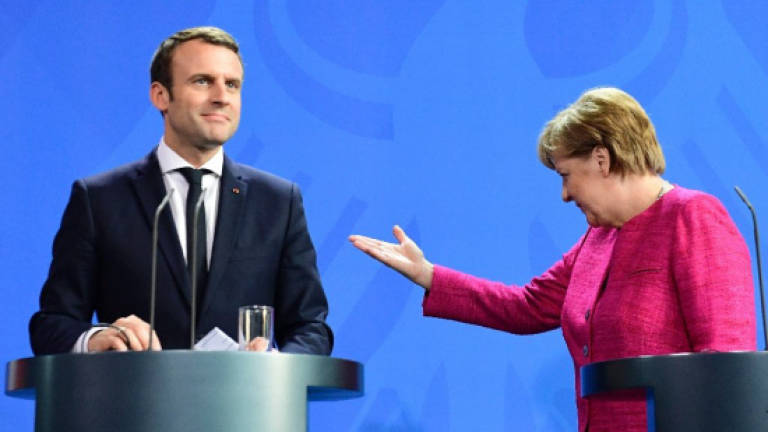 Merkel ready to consider Macron eurozone reform ideas