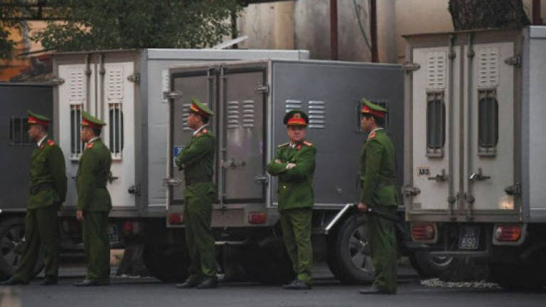 Vietnam arrests four oil execs in graft sweep