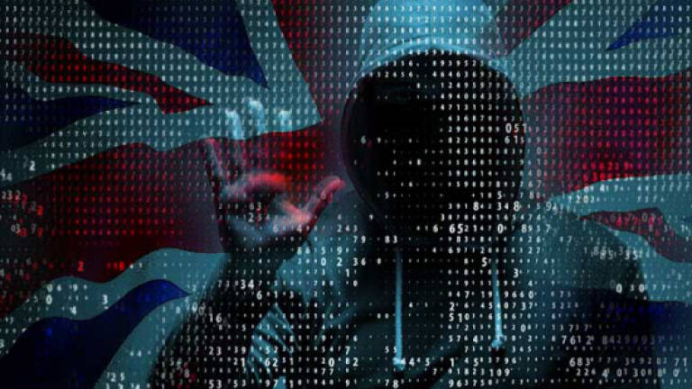 UK spy chiefs peel back secrecy: To fight cybercrime