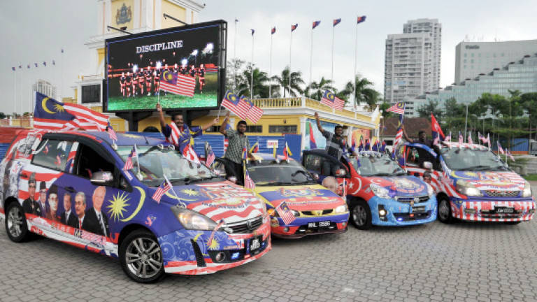 Businessman spends RM15,000 decorating four cars for Merdeka Day