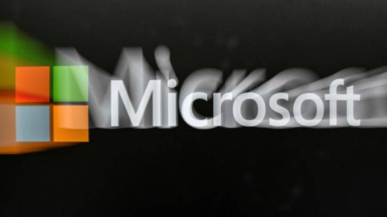 The Microsoft logo is pictured before CEO Satya Nadella's speech during an event named Microsoft Build AI Day in Kuala Lumpur on May 2, 2024. - AFPPIX