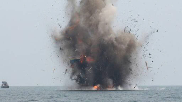 Indonesia defends opening fire on Chinese boat