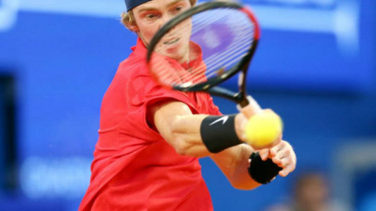 Lucky guy Rublev wins first career crown