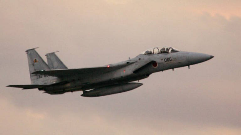 China slams Japan after jets targeted with 'decoy flares'