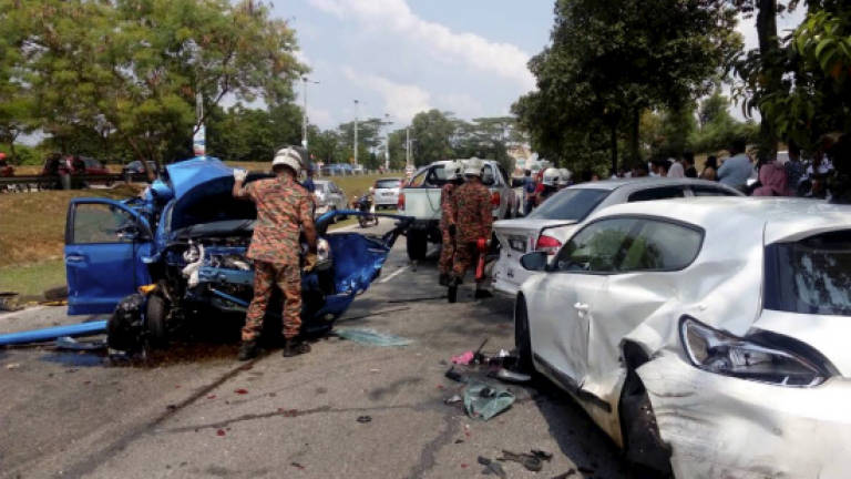 Two die, three hurt in accident involving four motorcycles and a stationary car