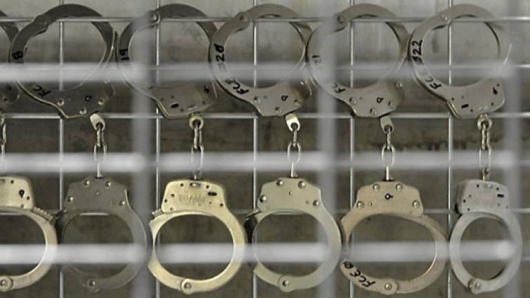 Cop among five men held for robbing foreign workers