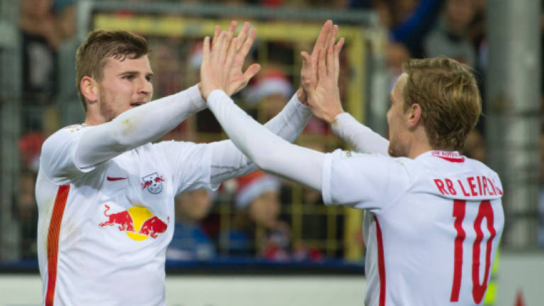 Impressive RB Leipzig win again to cement top spot