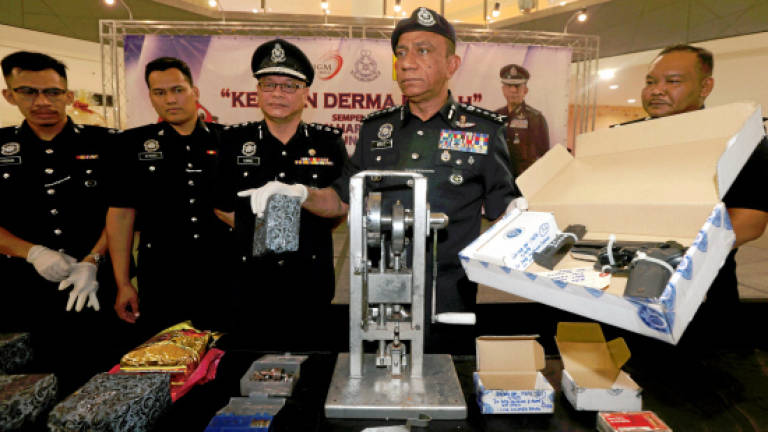 Drug trafficker nabbed, gun with 54 live bullets seized