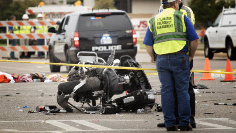 4 dead after car smashes into US parade crowd 4 dead after car smashes into US parade crowd
