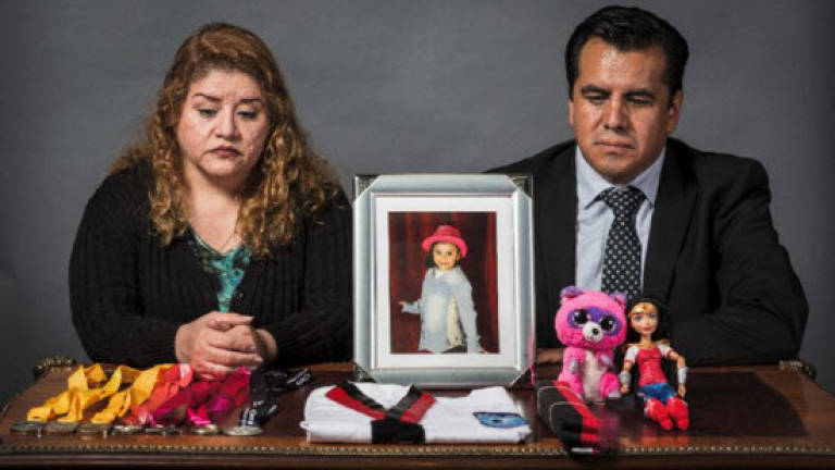 Parents of children killed in Mexico quake want justice