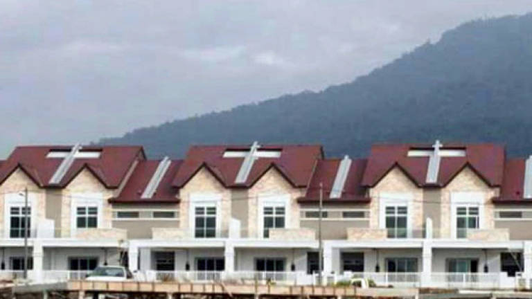 Netizens voice opinions over 'cross' air wells in Langkawi housing project