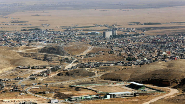 Iraq forces take Yazidi town of Sinjar from Kurds