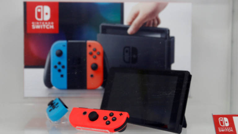 Nintendo nearly doubles net profit forecast on Switch console