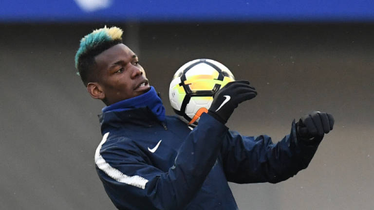 Pogba misses France training for treatment