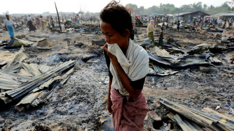 Bangladesh urges Myanmar to end unrest