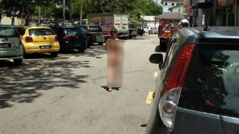 Police arrest Vietnamese woman for walking around naked in PJ Police arrest Vietnamese woman for walking around naked in PJ