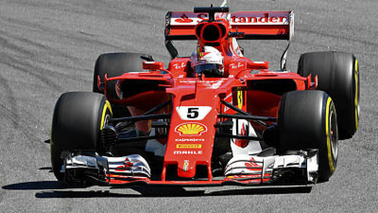 Vettel wins Brazilian GP, Hamilton fourth from pits