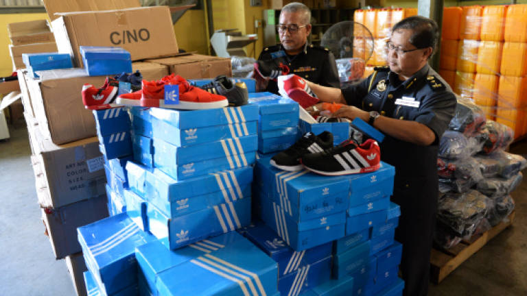 Perak KPDNKK seize fake branded shoes worth over RM62,000