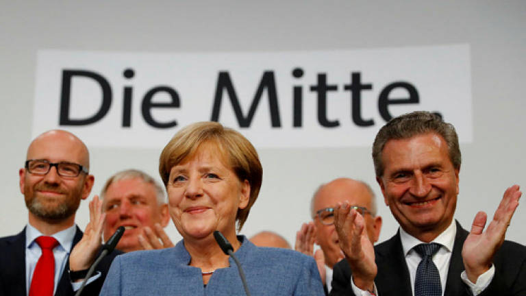 Merkel seeks partners in splintered Germany