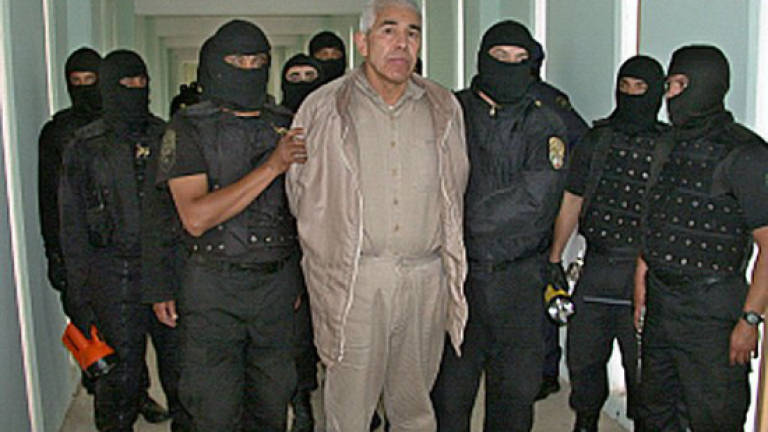 Former Mexican drug kingpin denies killing US agent
