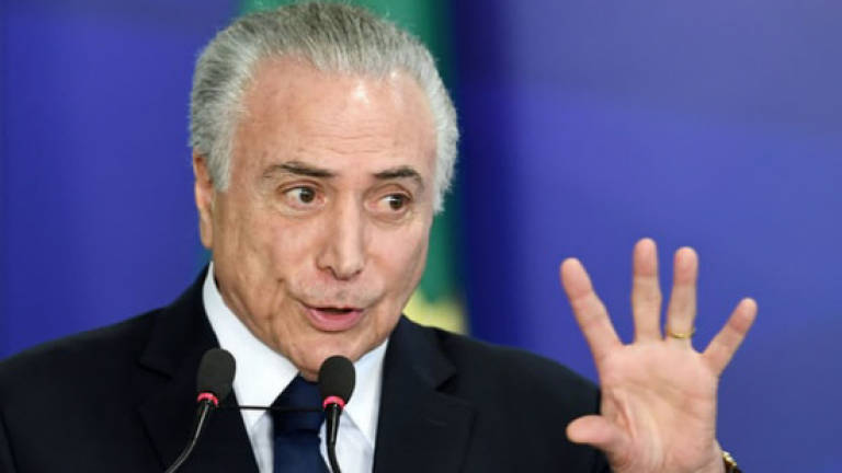 Brazil's congress throws out corruption charge against president