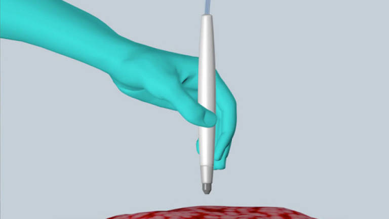 Pen-like tool helps surgeons spot cancer cells