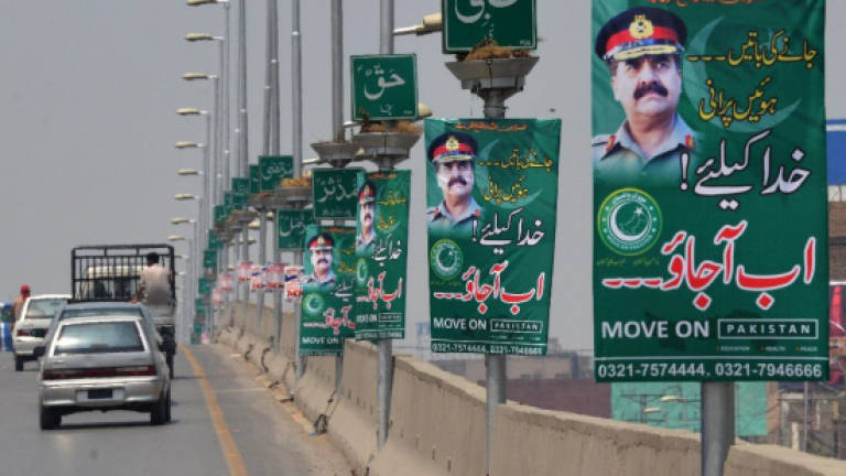 Posters begging for military coup raise eyebrows in Pakistan