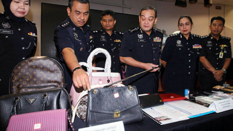 Woman charged for RM3.99m umrah scam (Updated)