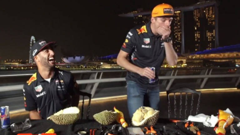 F1 drivers take on durian (Video)