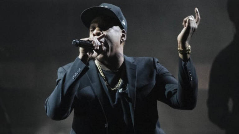 Week after exclusive, Jay-Z puts album on iTunes