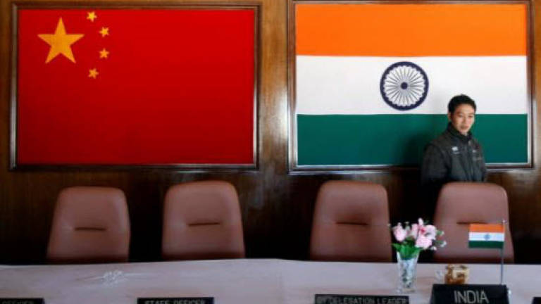 China says progress being made on India border talks