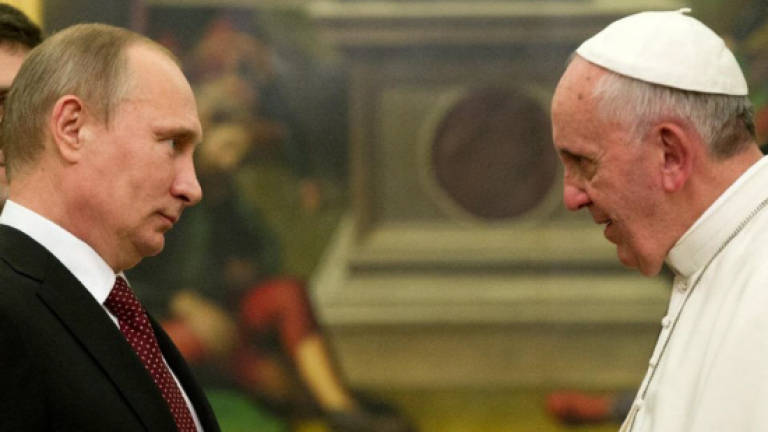 Putin to seek friendly ear with pope visit