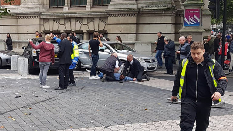 Man held after crash near London museum, 11 injured