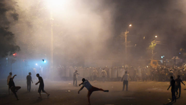 Protesters, police clash in Yerevan over hostage crisis