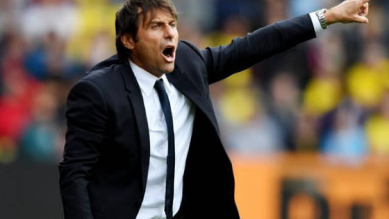 Conte happy to have selection headache for Barca clash