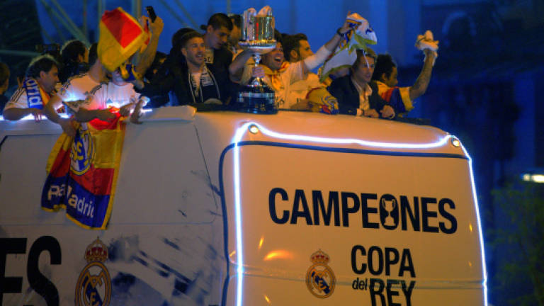 Real Madrid fans jam streets to celebrate Cup win