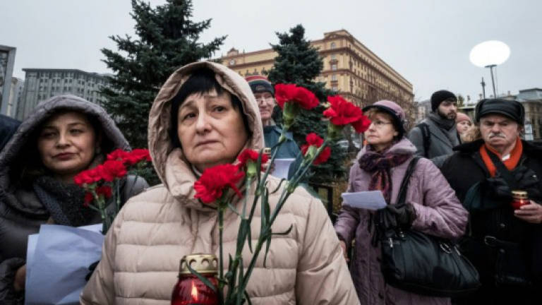 Russians honour Stalin victims, urge activist's release