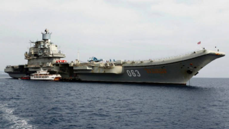Russian aircraft carrier jets conduct first Syria strikes