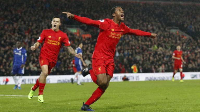 Liverpool face Chelsea crunch, City aim to stay hot