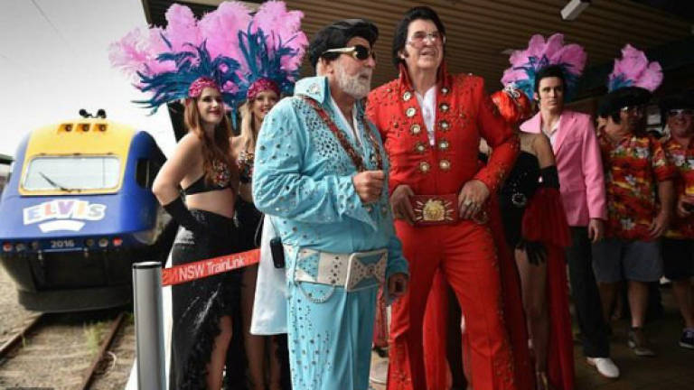 Elvis fans all shook up on Australia party train to annual fest