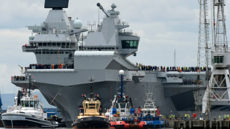 UK's new aircraft carrier sets sail for first time