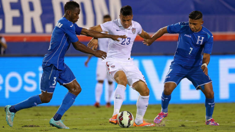 Late goal gives Honduras draw with host USA