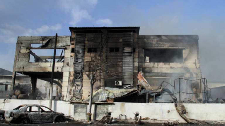 10 hours to put out fire that razed seven factories